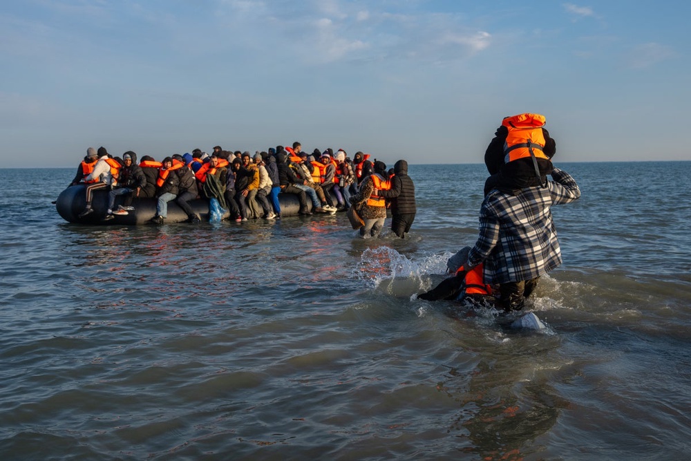 Image from: Channel boat fire latest: More than 150 migrants rescued after small boat catches fire