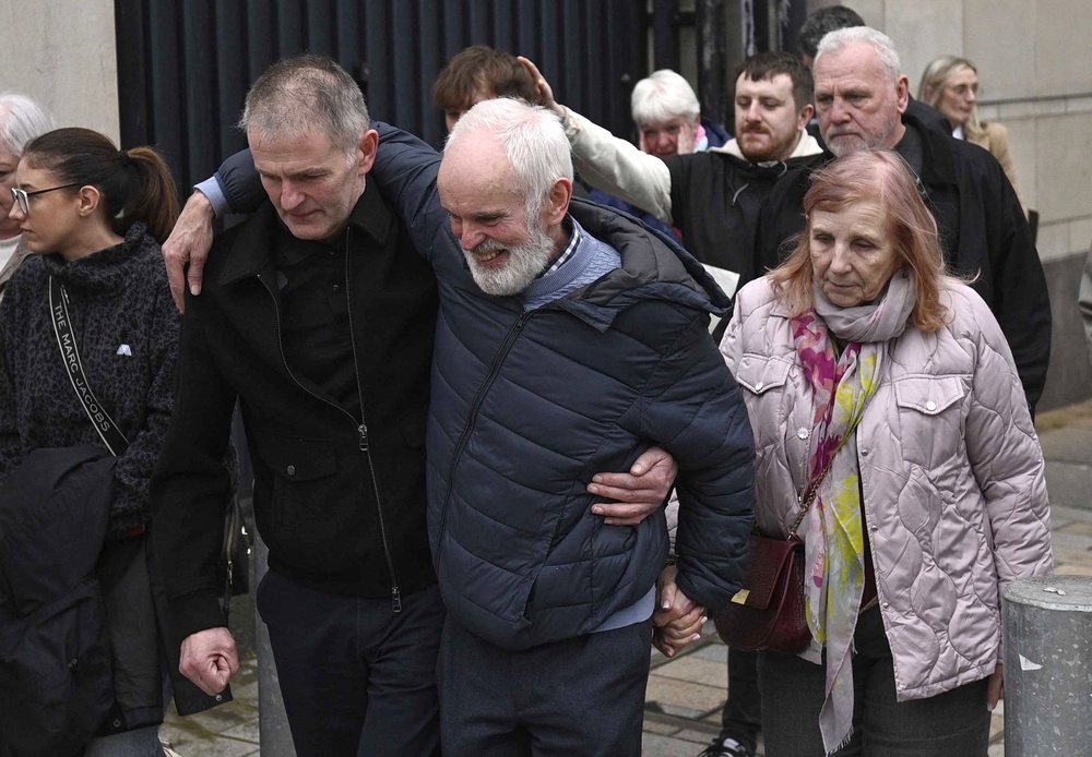 Noel and Bernie McNally, the parents of Natalie McNally outside Belfast Crown Court in March (PA) (PA Wire)