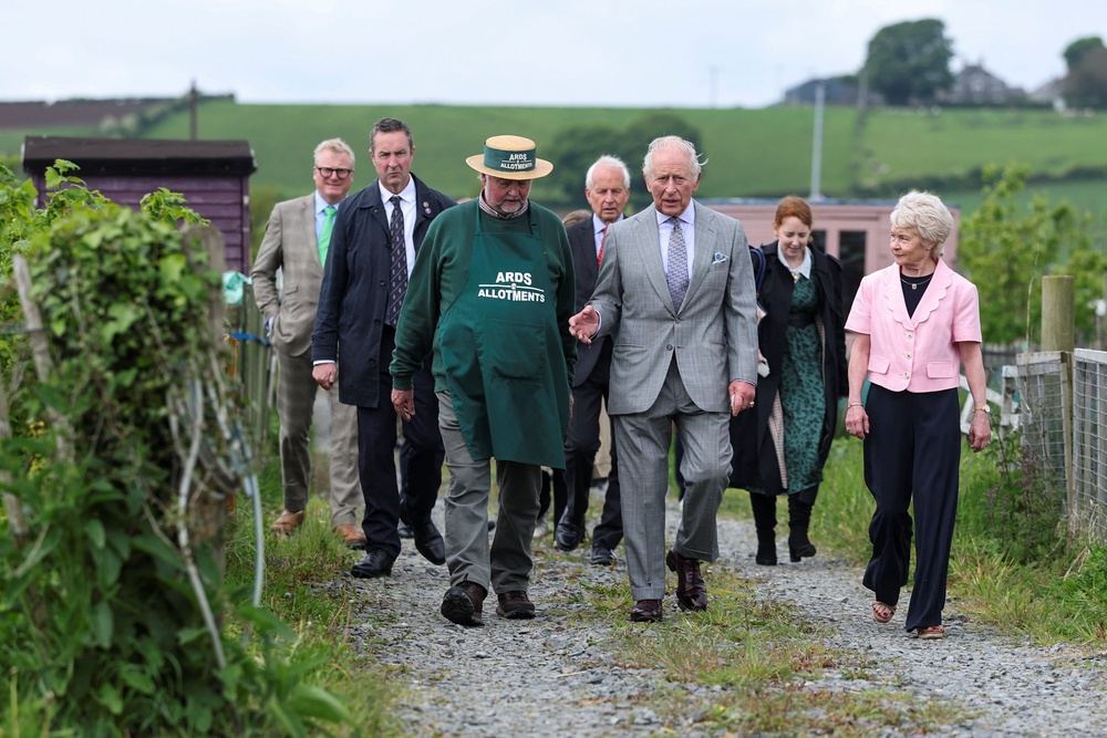 The founders of Ards Allotments, Maurice Patton and his wife Judith, led Charles on a tour of the space (Toby Melville/PA) (PA Wire)