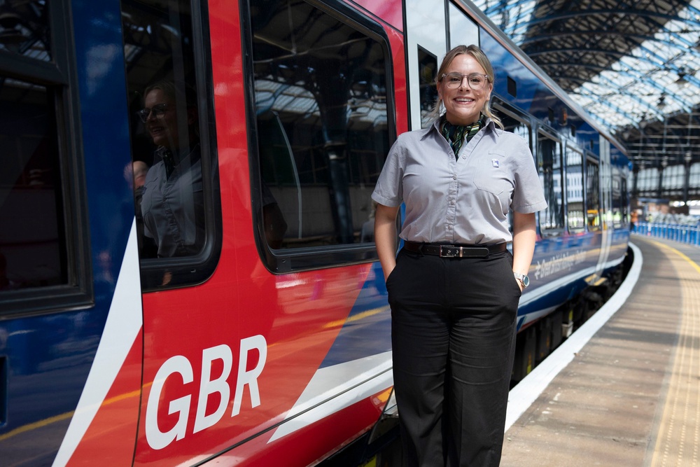 Train driver Kate Wilcox poses at Brighton Station on 21 May 2026 in Brighton, England (Getty)