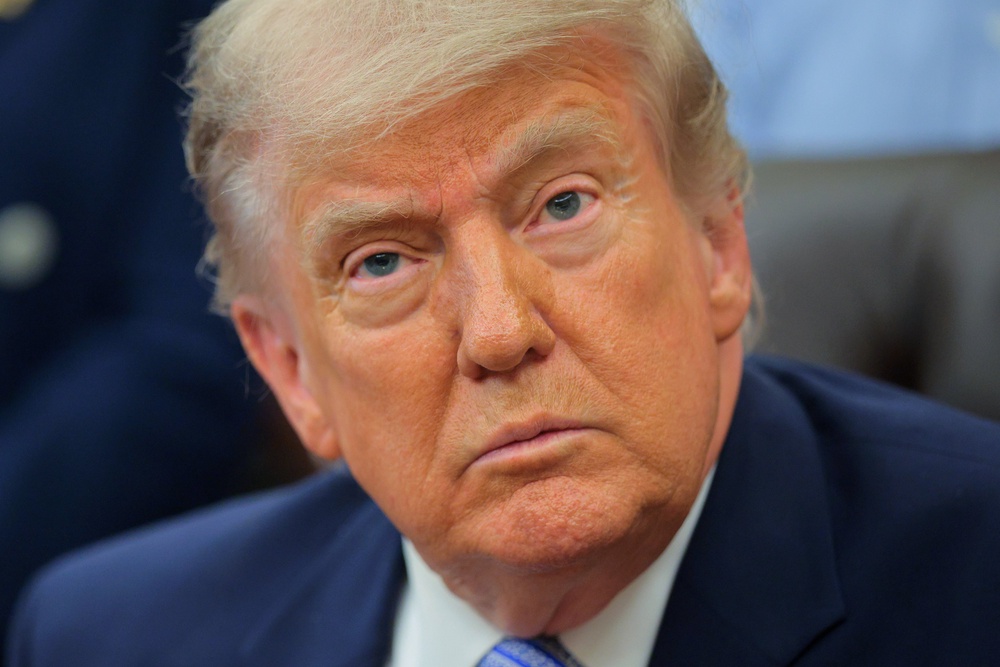 U.S. President Donald Trump looks on during an event in the Oval Office of the White House on May 21 (Getty)