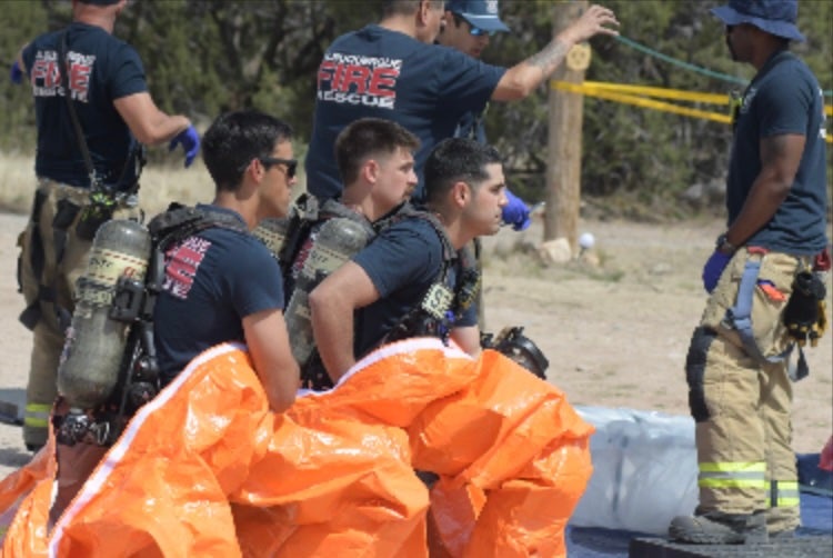Eighteen first responders were exposed to an 'unidentified substance' and taken to the hospital, state police said (Albuquerque Fire Rescue)