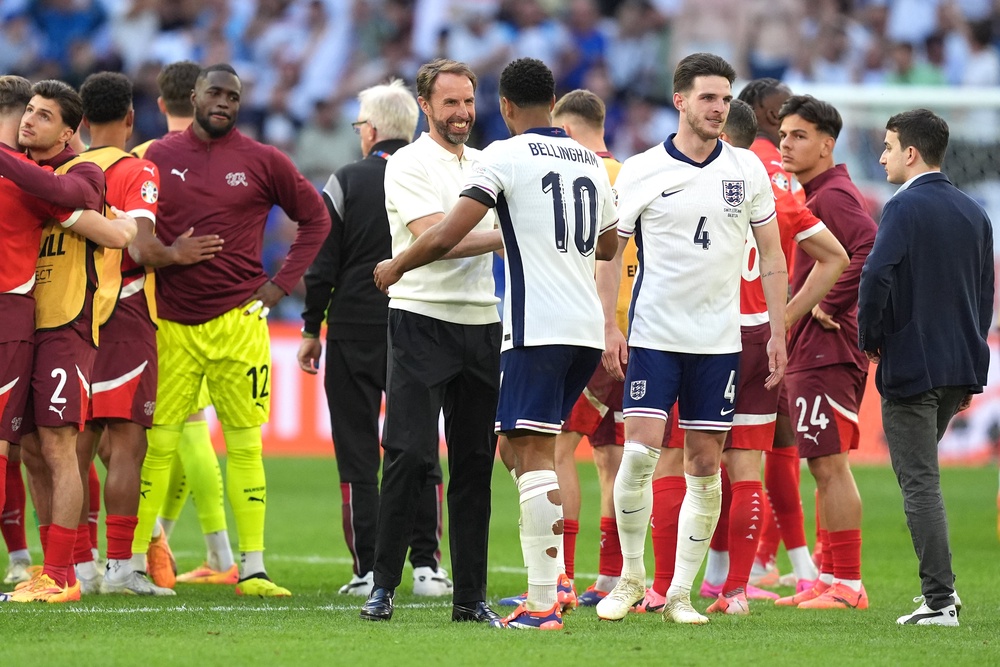 Jude Bellingham and Gareth Southgate celebrate after victory in the penalty shoot-out following extra time in the UEFA Euro 2024 (Martin Rickett/PA) (PA Archive)