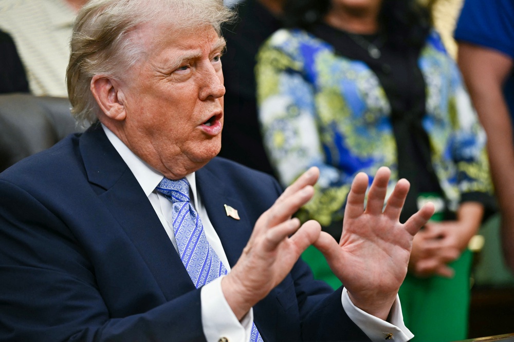 ‘I feel it is important for me to remain in Washington, D.C., at the White House during this important period of time,’ Trump said (AFP/Getty)
