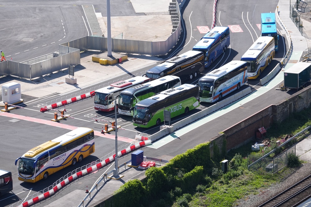 Coaches queuing for their passengers to complete the EU entry-exit system checks (Gareth Fuller/PA) (PA Wire)