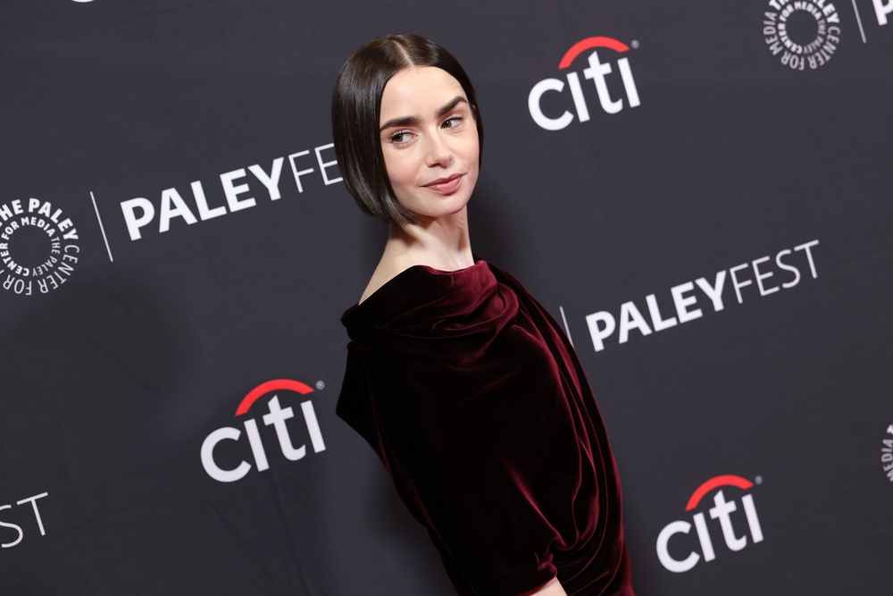 Lily Collins apparently confronted Liam over the Oasis brothers’ remarks about her dad (Getty)