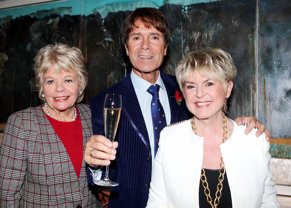Chalmers, Cliff Richard and Gloria Hunniford attend The Lady Taverners’ tribute lunch for the singer at London’s Dorchester hotel in 2012 (PA)