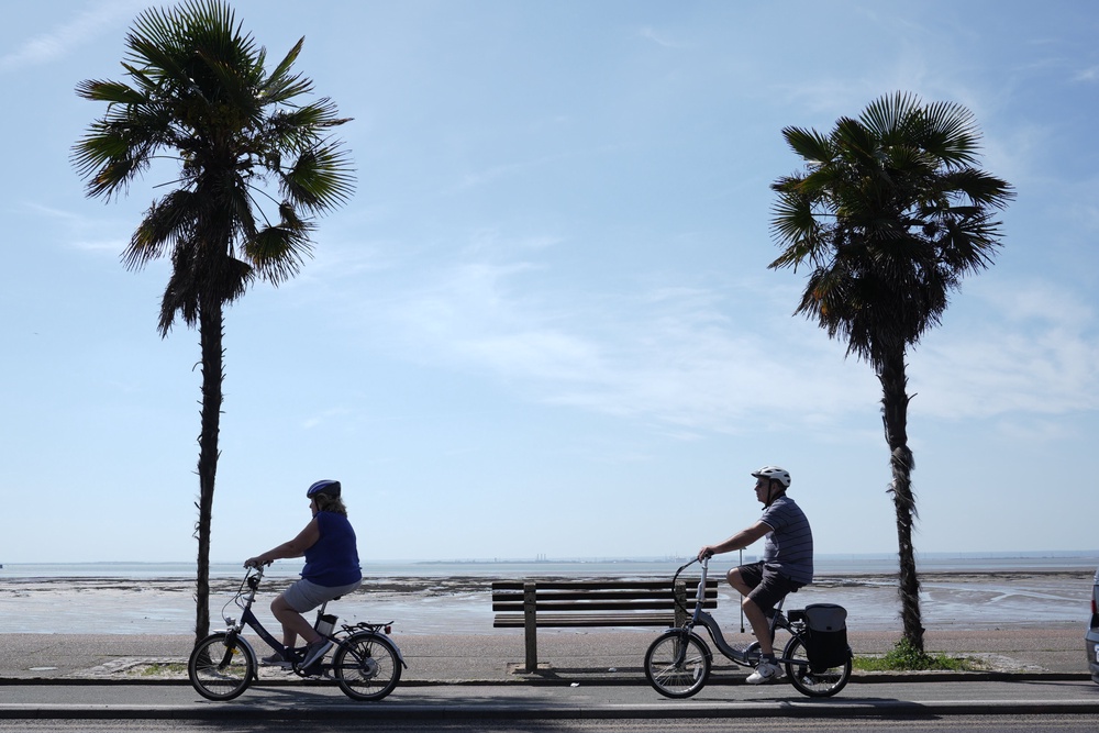 People cycling along the seafront in Southend-on-Sea, Essex as amber heat health alerts were issued (Stefan Rousseau/PA) (PA Wire)