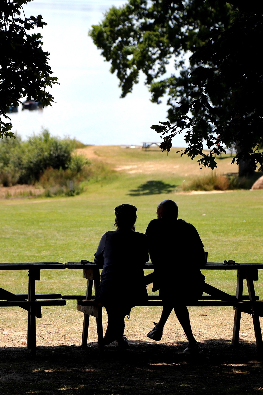 The NHS advises people to stay out of the sun where possible (Gareth Fuller/PA) (PA Archive)