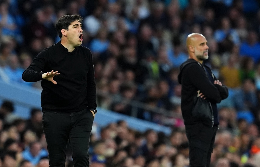 Bournemouth head coach Andoni Iraola (left) came up against Pep Guardiola (right) as both a player and manager (Martin Rickett/PA) (PA Archive)