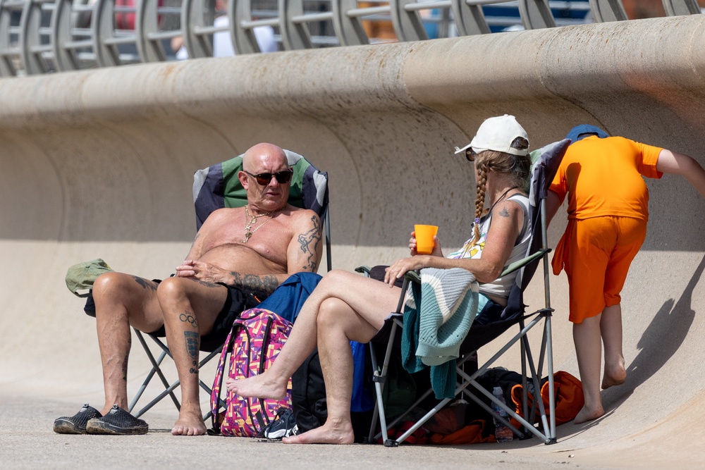 Sunbathers enjoy the heat on Blackpool Beach. (Getty)