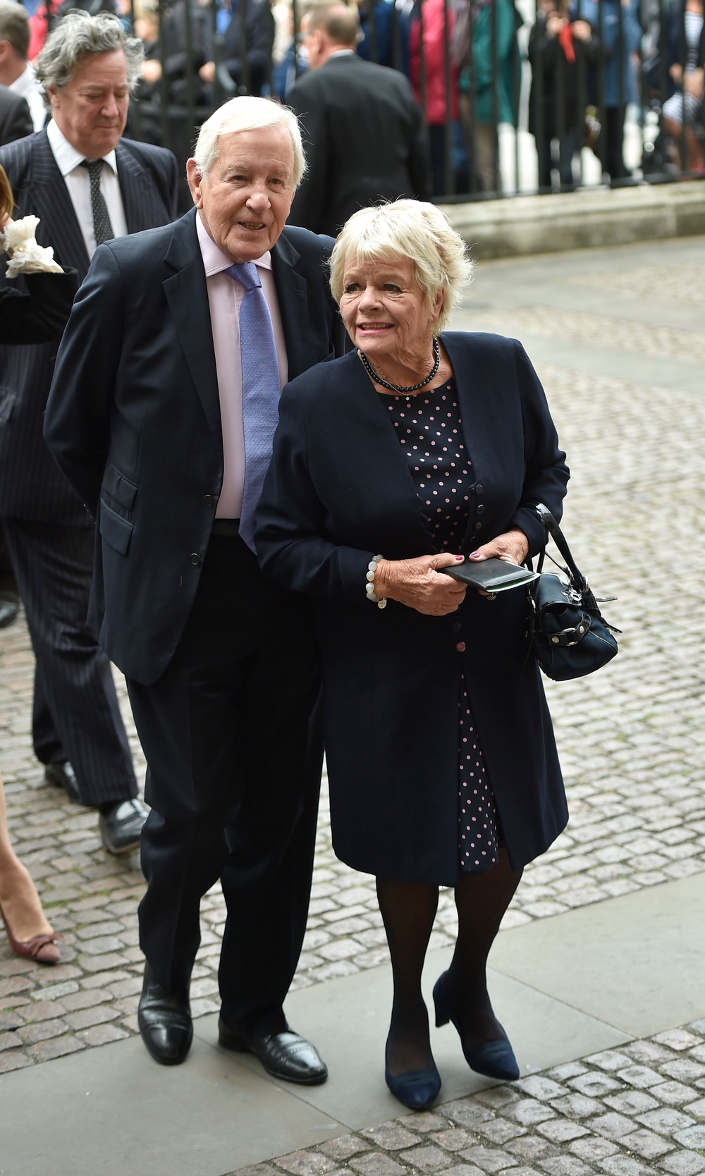 Judith Chalmers and husband Neil Durden-Smith arrive for the service of thanksgiving for Sir Terry Wogan at Westminster Abbey (Hannah McKay/PA) (PA Archive)