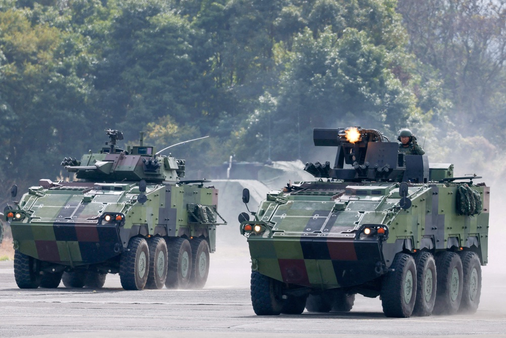 CM-32 armoured vehicles during military exercises in Taichung, Taiwan (Reuters)