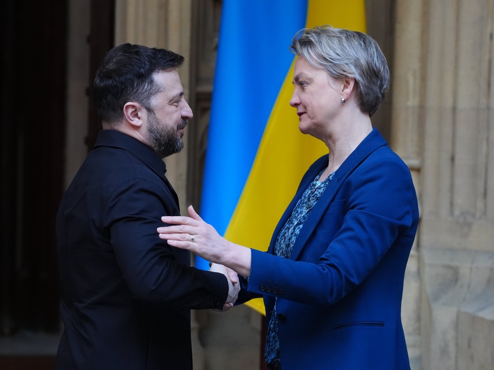 Ukrainian President Volodymyr Zelensky shakes hands with Foreign Secretary Yvette Cooper during a visit to the Houses of Parliament in March (Jonathan Brady/PA) (PA Wire)