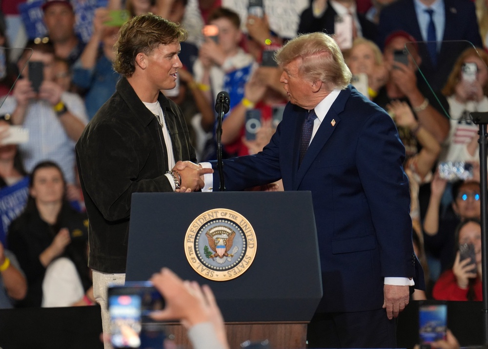 Jaxson Dart introduced Donald Trump at a Fighting For American Workers event in New York (AP)