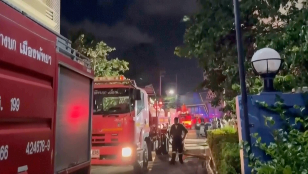 Firefighters and rescue workers rush to JA Plus Hotel to evacuate over 240 guests (AP)