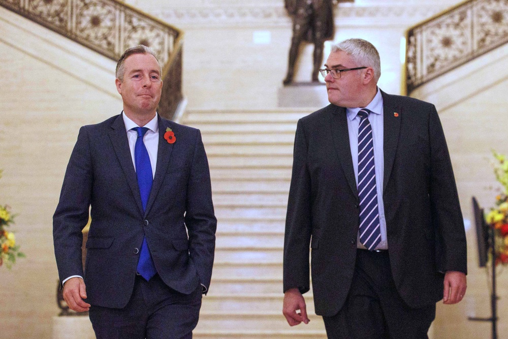 Northern Ireland Education Minister Paul Givan (left) walks with DUP leader Gavin Robinson (Liam McBurney/PA) (PA Archive)