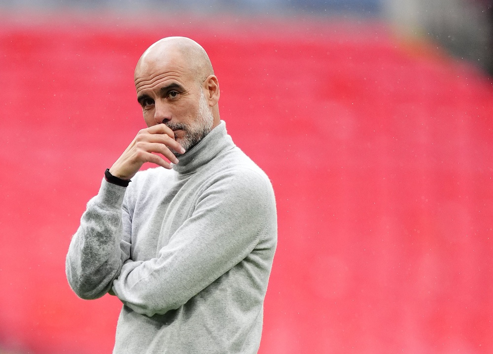 The auction features a wide array of memorabilia from Guardiola’s office, including his chair, desk lamp, and whistle, alongside several framed pictures (PA)