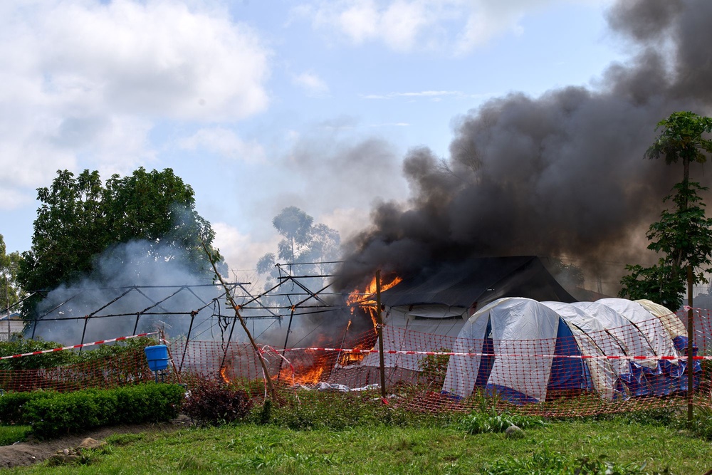 The treatment centre in Rwampara was burned on Thursday after family members were prevented from retrieving a local man's body (AP Photo/Dirole Lotsima Dieudonn)