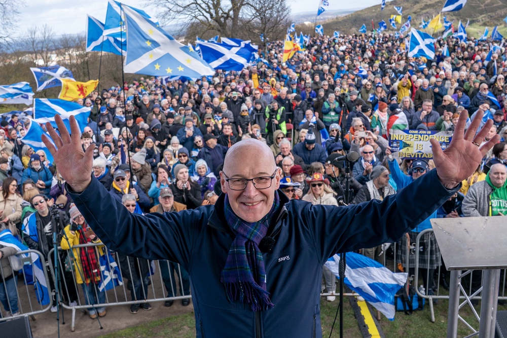 First Minister John Swinney on stage after speaking at a rally for independence organised by Believe in Scotland. (Jane Barlow/PA) (PA Wire)