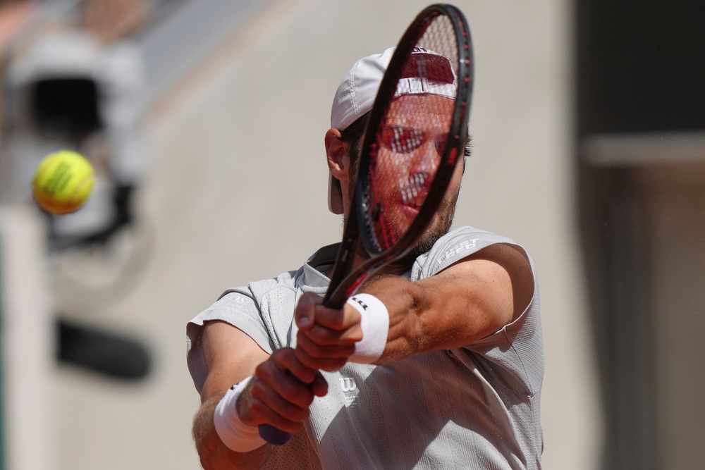 Karen Khachanov of Russia returns to Arthur Gea of France during the first round men's singles tennis match at the French Open tennis tournament in Paris, Sunday, May 24, 2026 (AP Photo/Aurelien Morissard)