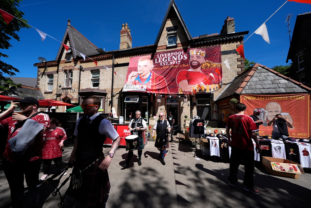A banner featuring Liverpool's Mohamed Salah and Andrew Robertson (PA)