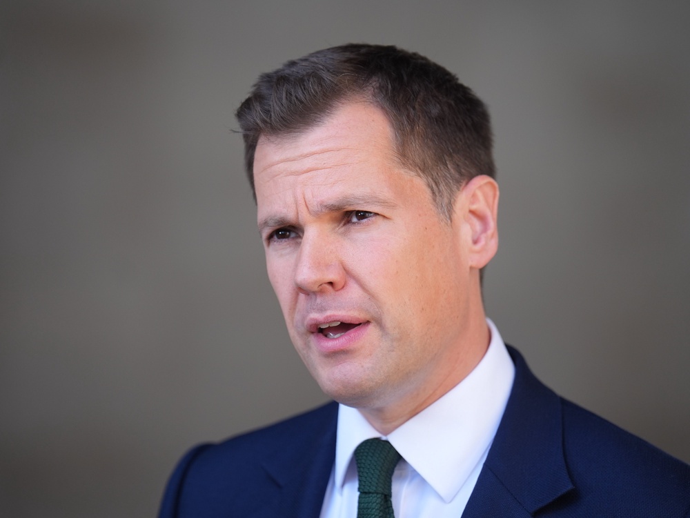 Robert Jenrick insists that foreign nationals living in social housing will not be deported (PA)
