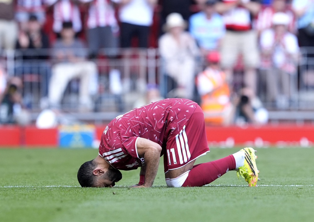 Salah kissed the turf as he substituted in the 74th minute (Peter Byrne/PA) (PA Wire)