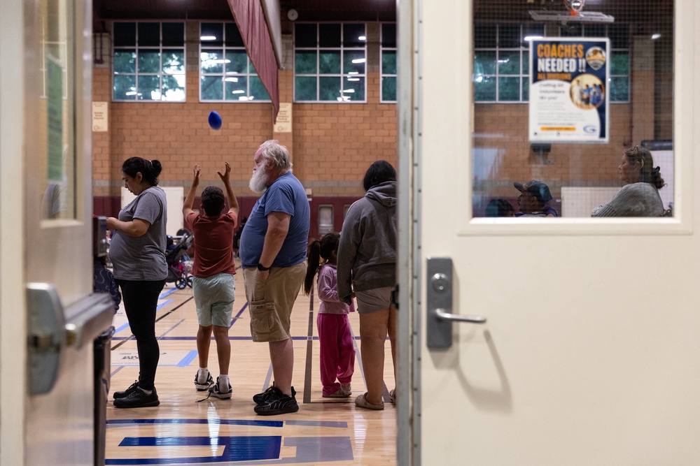 Evacuees wait in line for food after a chemical leak from a large storage tank threatened residents in Garden Grove, California on May 22. Nearly 50,000 people have been evacuated (AFP/Getty)