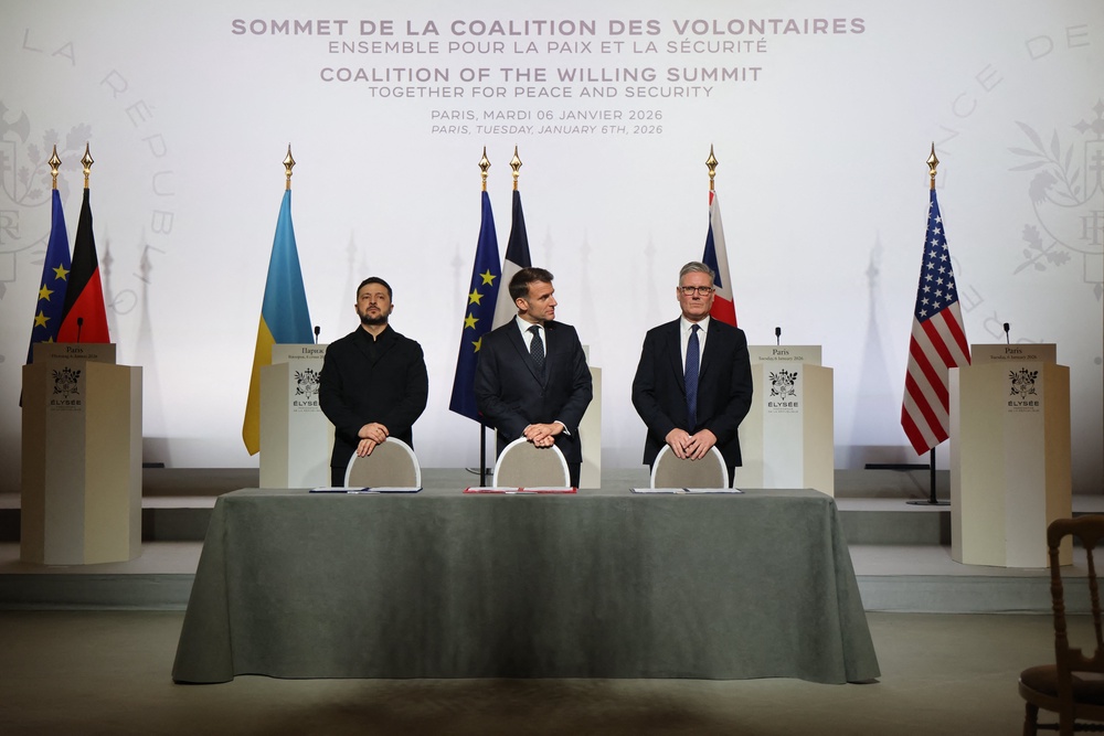 Ukraine president Volodymyr Zelensky, France's president Emmanuel Macron and prime minister Keir Starmer look on ahead of the signing of the declaration on deploying post-ceasefire force in Ukraine (AFP/Getty)