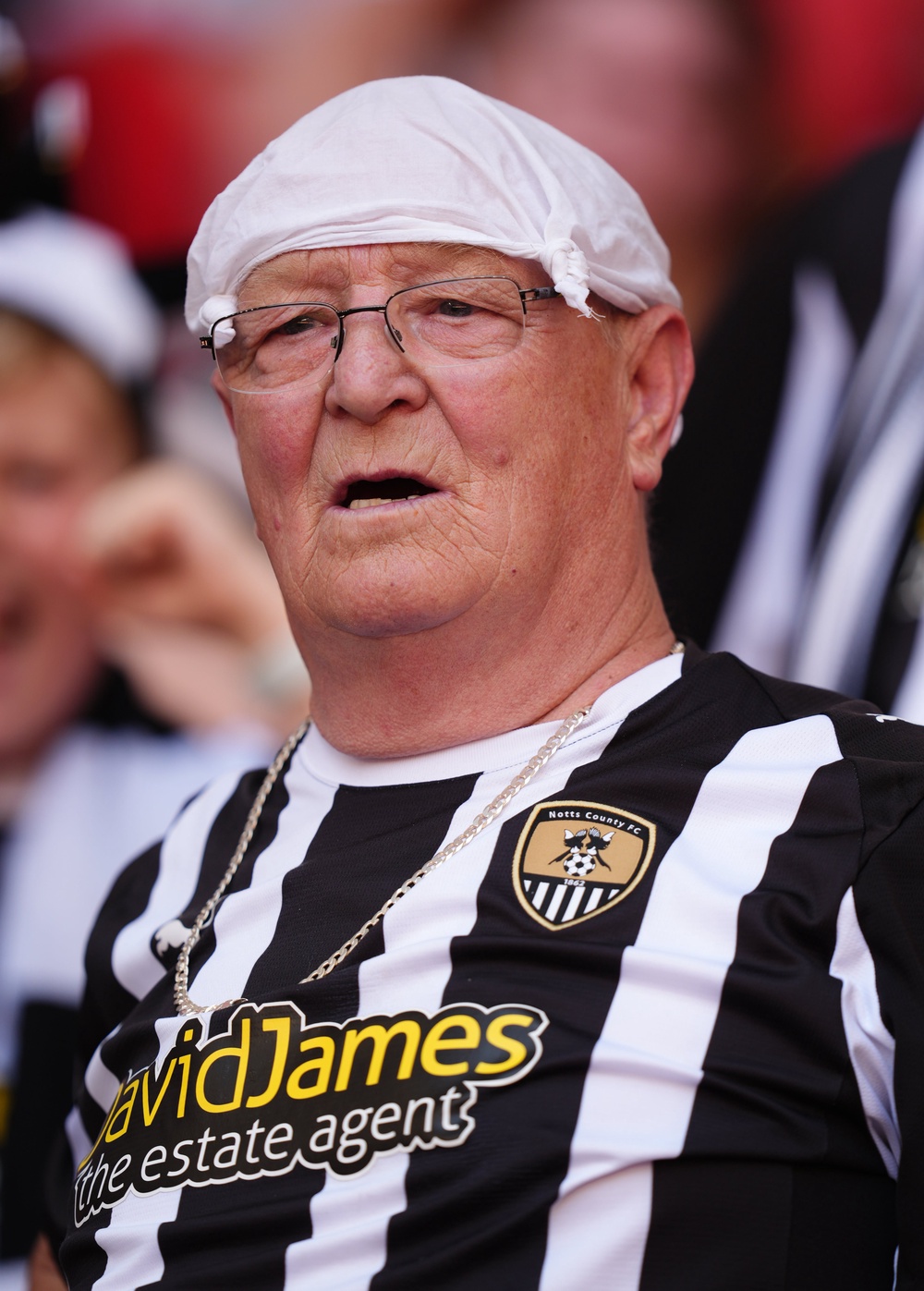 A knotted hanky kept the sun off the head of a Notts County fan in the stands for the Sky Bet League Two play-off final at Wembley Stadium (John Walton/PA) (PA Wire)