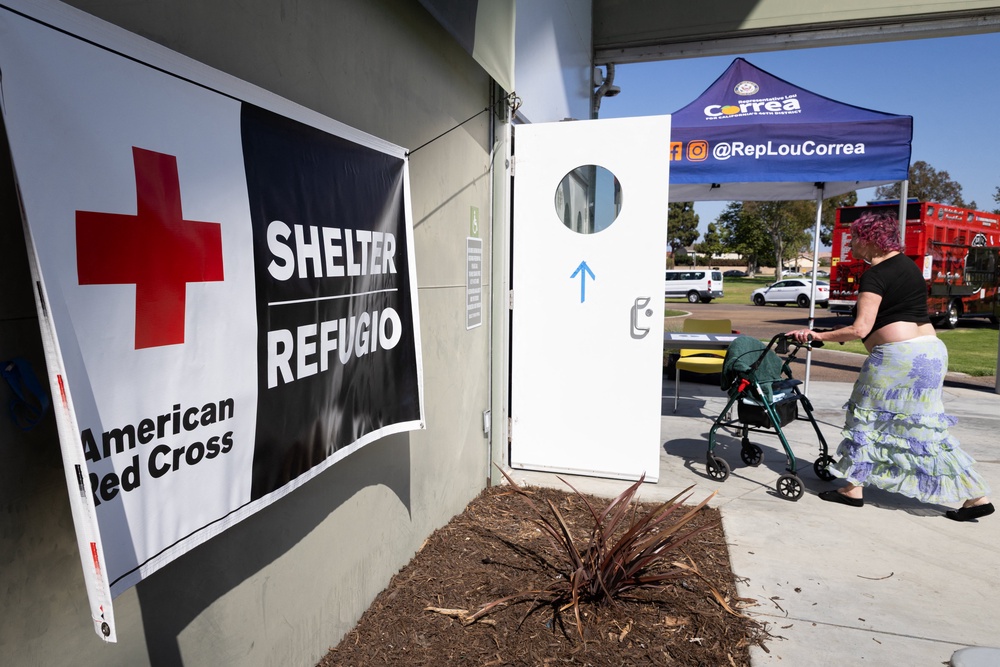 A woman enters an evacuation shelter in Fountain Valley, California. (AFP/Getty)