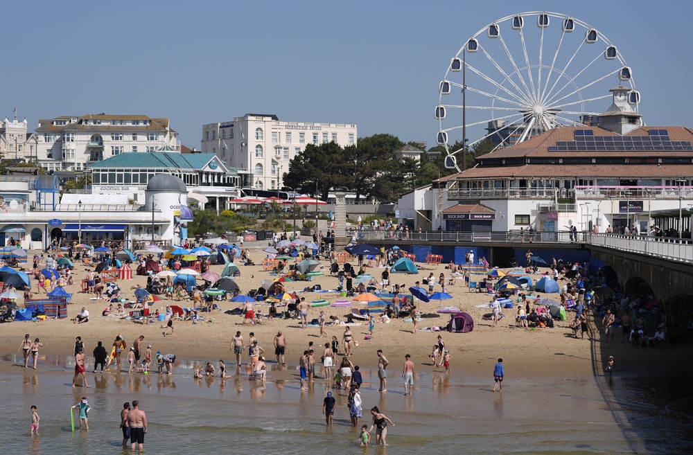 People lap up the sun on Bournemouth beach in Dorset on Monday (Andrew Matthews/PA) (PA Wire)