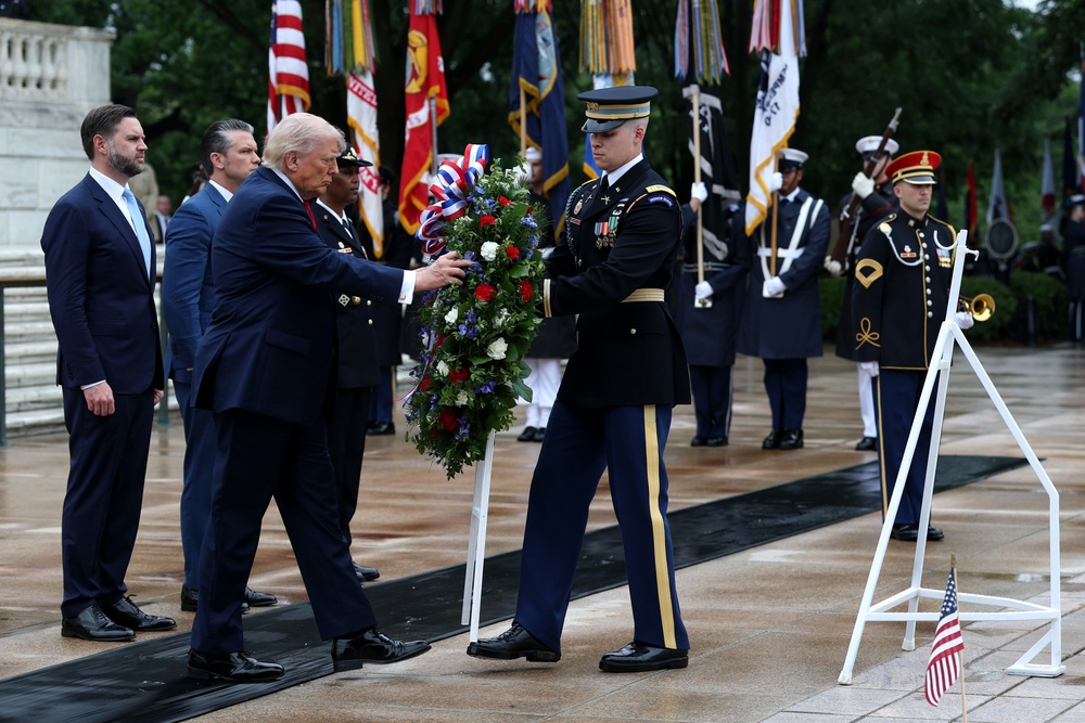 The president participated in a wreath-laying at Arlington to commemorate fallen soldiers before addressing a crowd at the event (Getty)