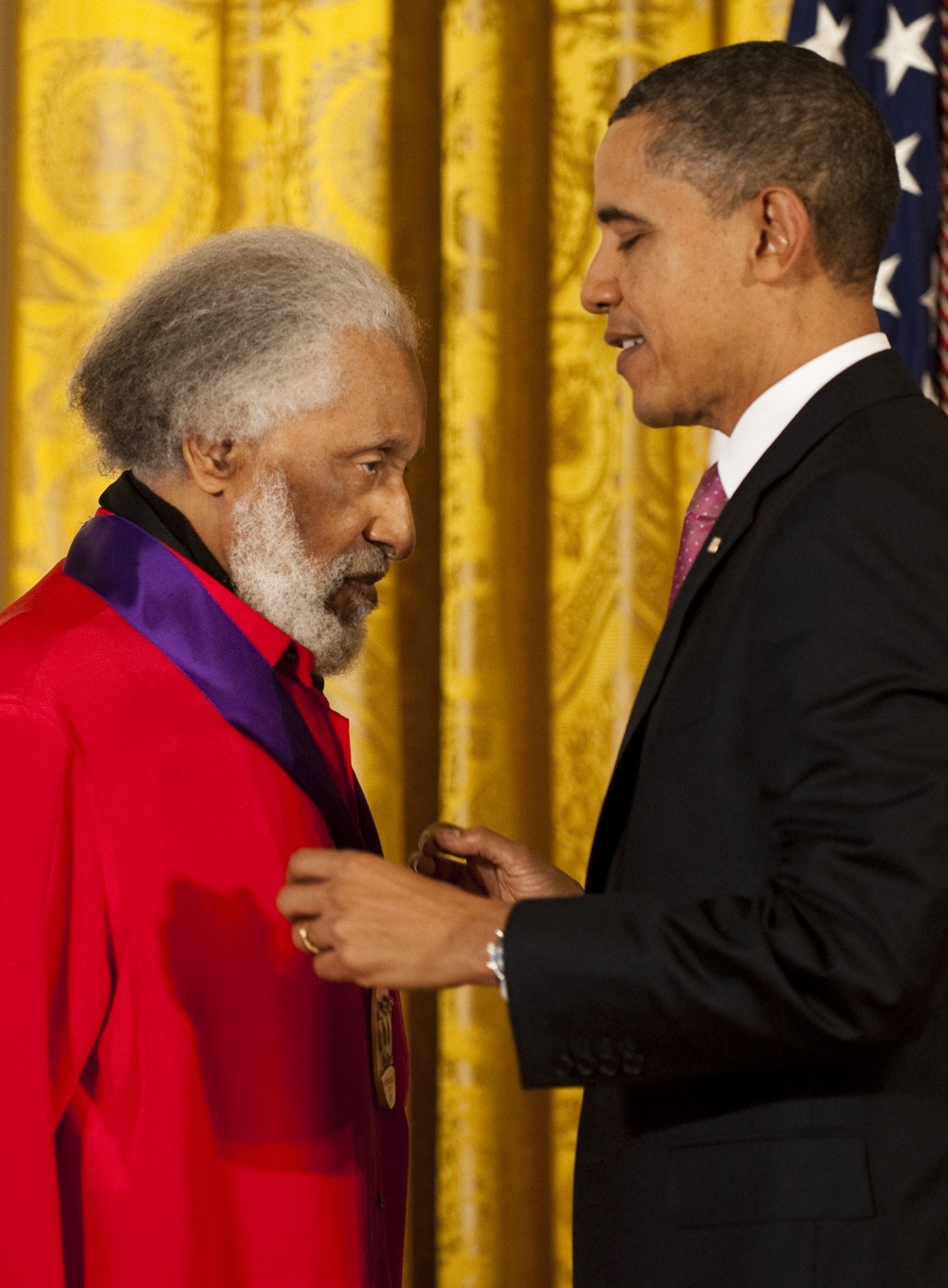 Former US president Barack Obama awards the 2010 National Medal of Arts to Grammy-winning American jazz tenor Sonny Rollins at the White House in Washington, DC, in 2011 (AFP/Getty)