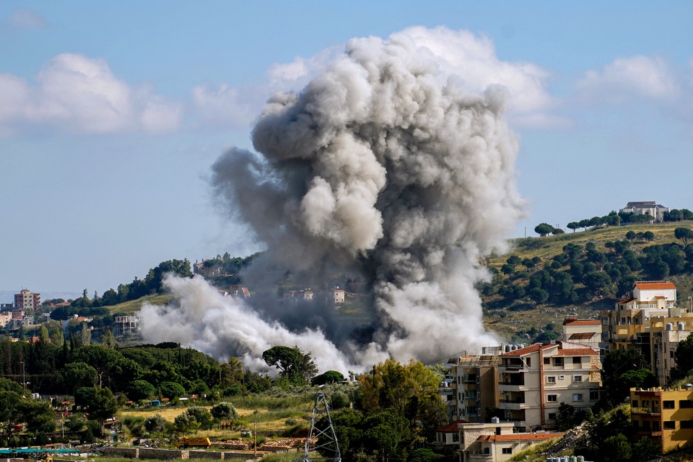 Smoke rises following an Israeli airstrike that targeted the southern Lebanese village of Nabatieh (AFP/Getty)