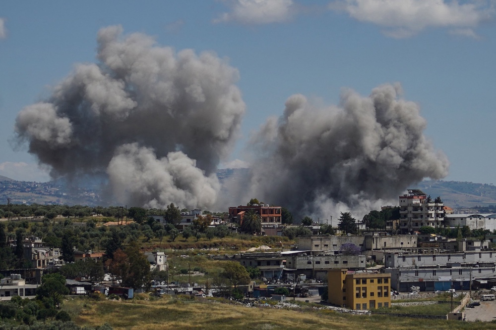 Smoke rises following an Israeli strike on the southern village of Nabatieh on Sunday, May 24 (AFP/Getty)