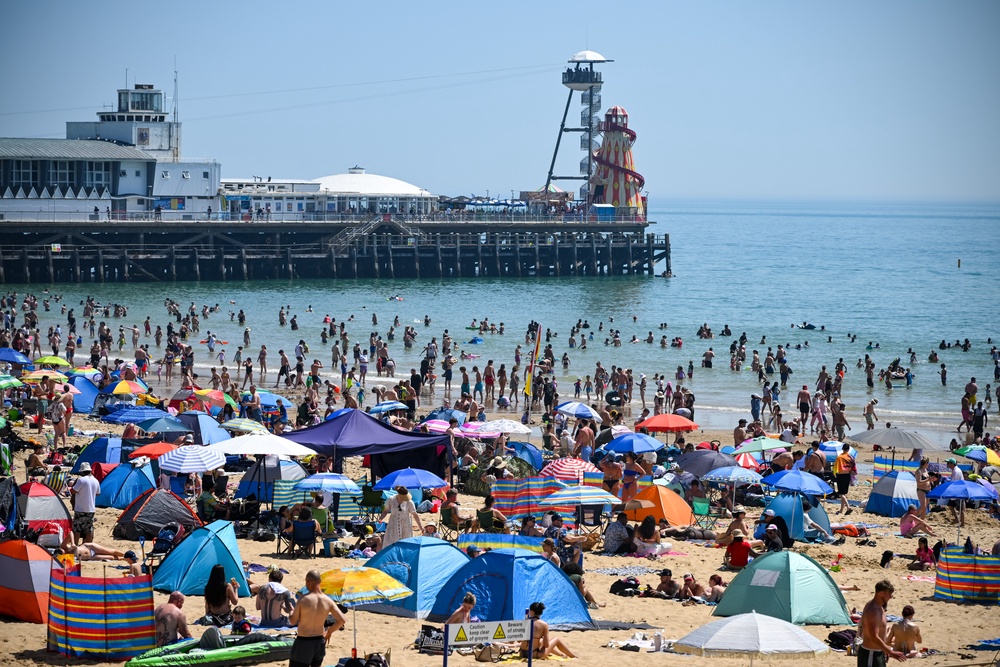 People across Britain flocked to beaches over the bank holiday weekend as temperatures soared (Getty)