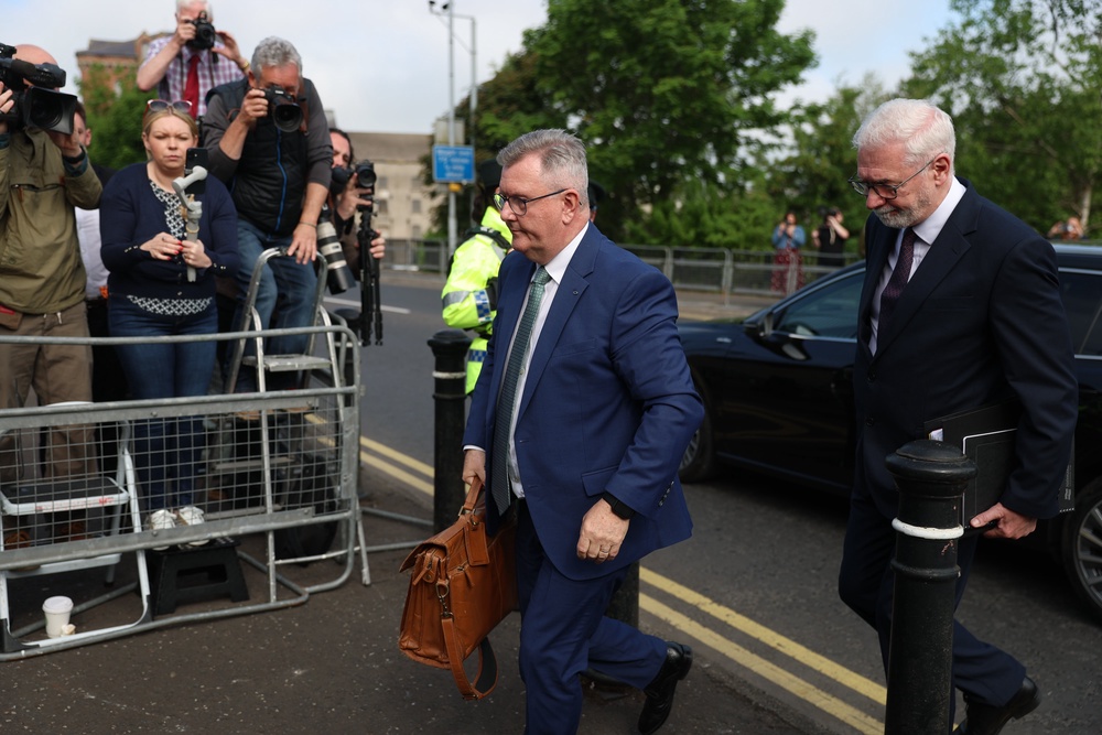 Sir Jeffrey Donaldson with his solicitor John McBurney as he arrives at Newry Crown Court (Liam McBurney/PA) (PA Wire)