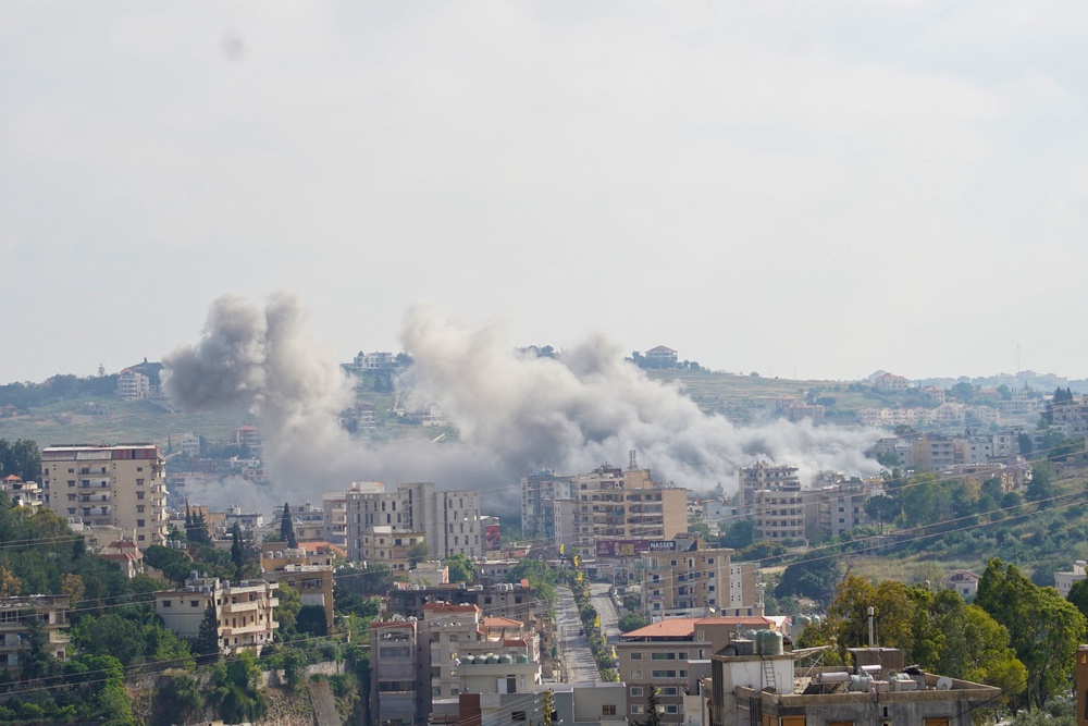 Smoke trails are pictured from the Israeli missile strike that targeted the village of Nabatieh on May 26 (AFP/Getty)