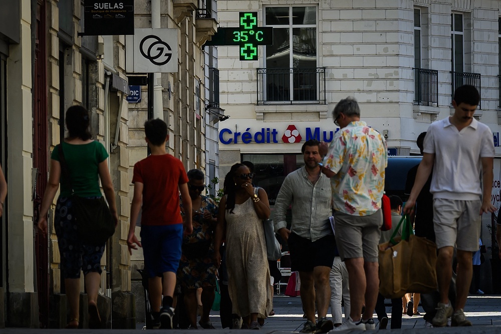 A street scene as temperatures hit 35C in Nantes, France, which is among several other European countries enduring record-breaking extreme heat right now (AFP/Getty)