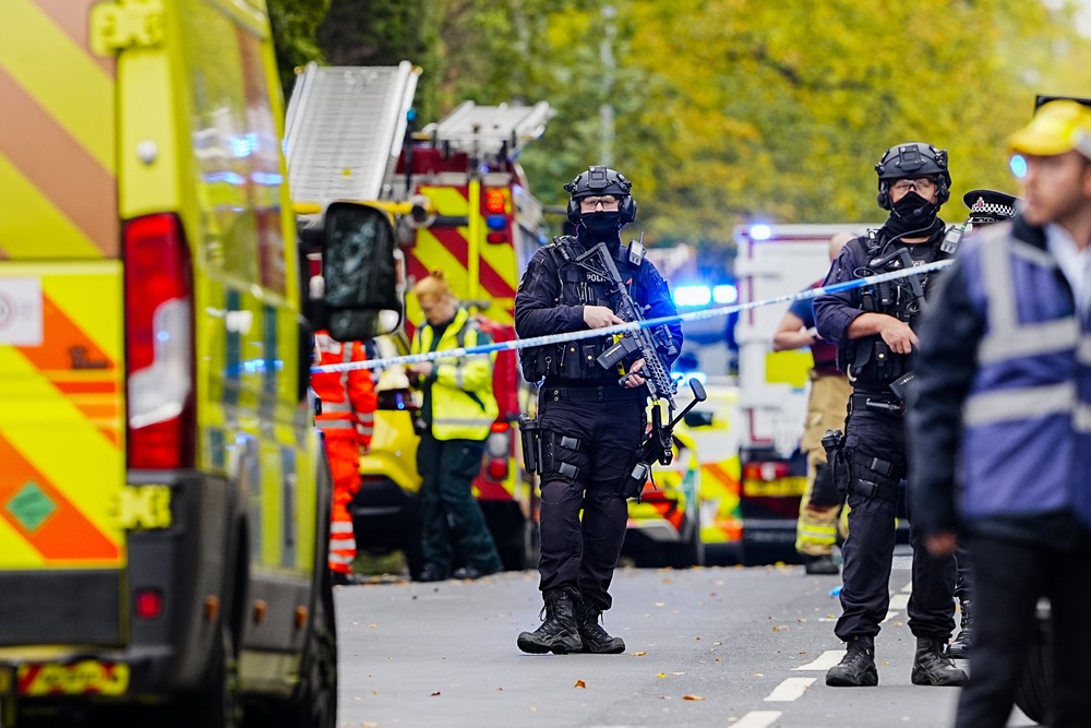 Armed police officers at the scene of an incident at Heaton Park Hebrew Congregation synagogue in Crumpsall (Peter Byrne/PA) (PA Wire)