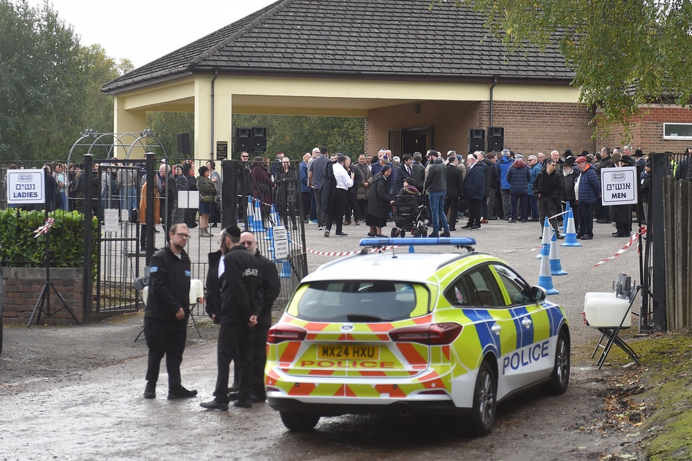 Police presence at the funeral of Adrian Daulby (PA) (PA Archive)