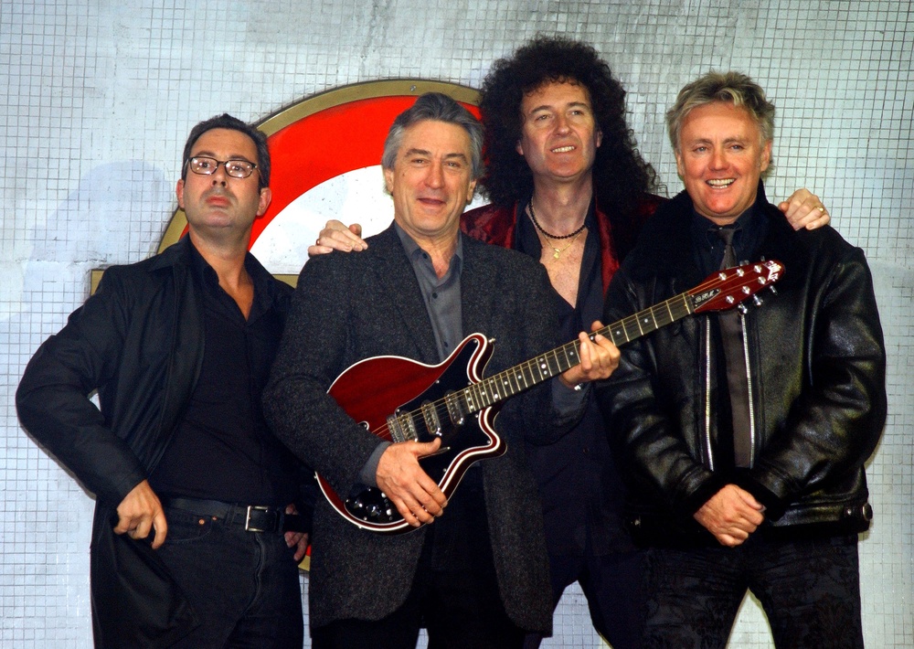 Elton at the launch of the musical 'We Will Rock You' in 2002, alongside Queen's Brian May and Roger Taylor, and producer Robert De Niro (Getty Images)