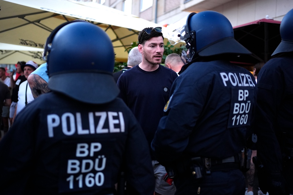 The Press Association reported the disturbance happened outside an Irish bar, where German police later detained several English people (Jordan Pettitt/PA)