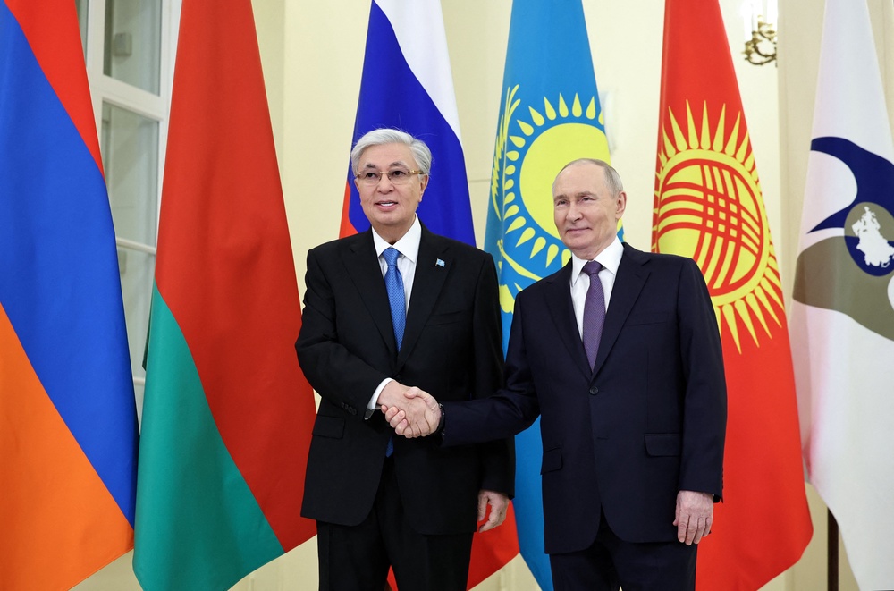 Russian president Vladimir Putin met Kazakhstan's President Kassym-Jomart Tokayev  in Saint Petersburg on 21 December 2025 (AFP/Getty)