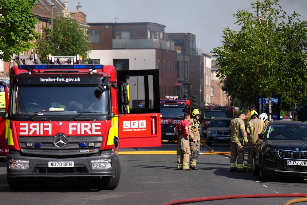 Firefighters at the scene of the blaze (Aaron Chown/PA) (PA Wire)