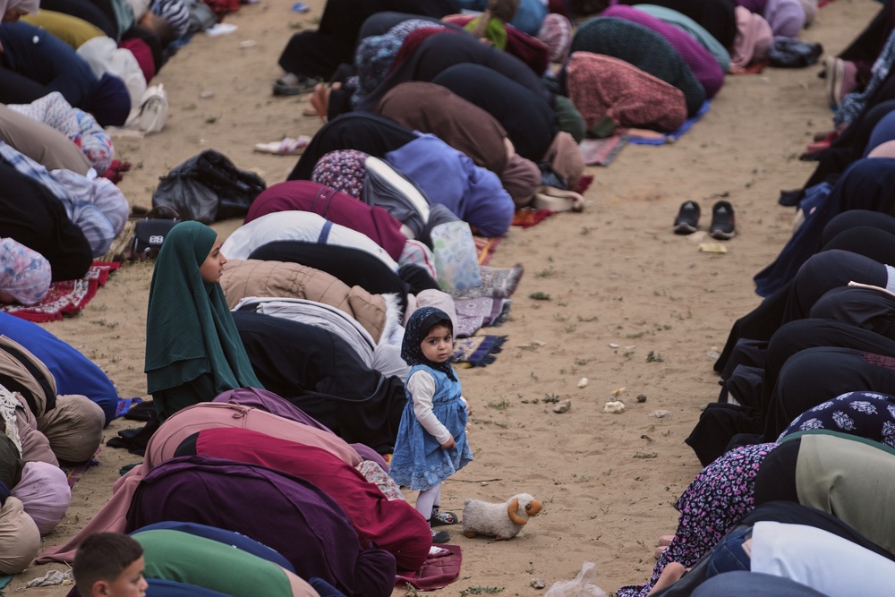Muslims praying during Eid al-Adha prayers in Gaza City on Wednesday, 27 May 2026 (AP)