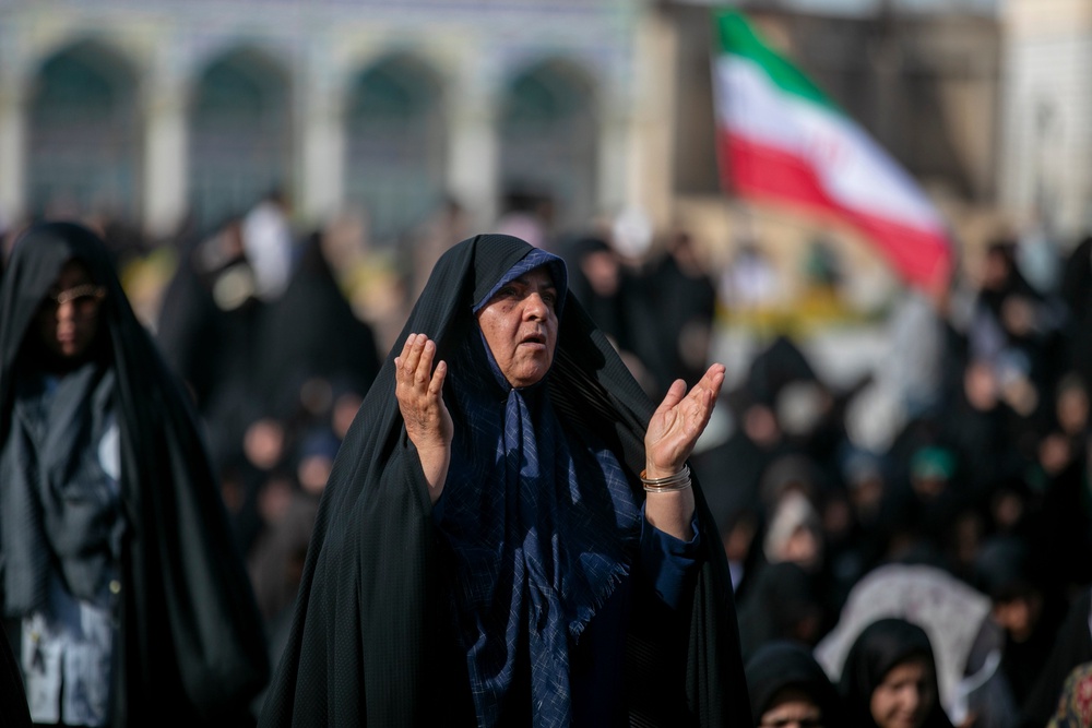 A woman attends a religious ceremony during Eid al-Adha in Qom, Iran. Eid-ul-Adha honours the willingness of Prophet Ibrahim to sacrifice his son, Ismail, in obedience to God's command and marks the conclusion of the annual Hajj pilgrimage to Mecca (Getty)