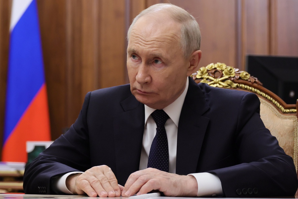 Russian President Vladimir Putin listens to Deputy Prime Minister Dmitry Patrushev, during their meeting at the Kremlin in Moscow (AP)